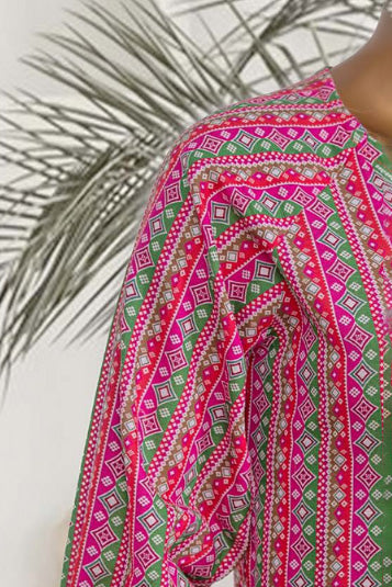 Magenta Khaddar Kurta set with traditional Pakistani green and white geometric patterns for stylish cultural wear.