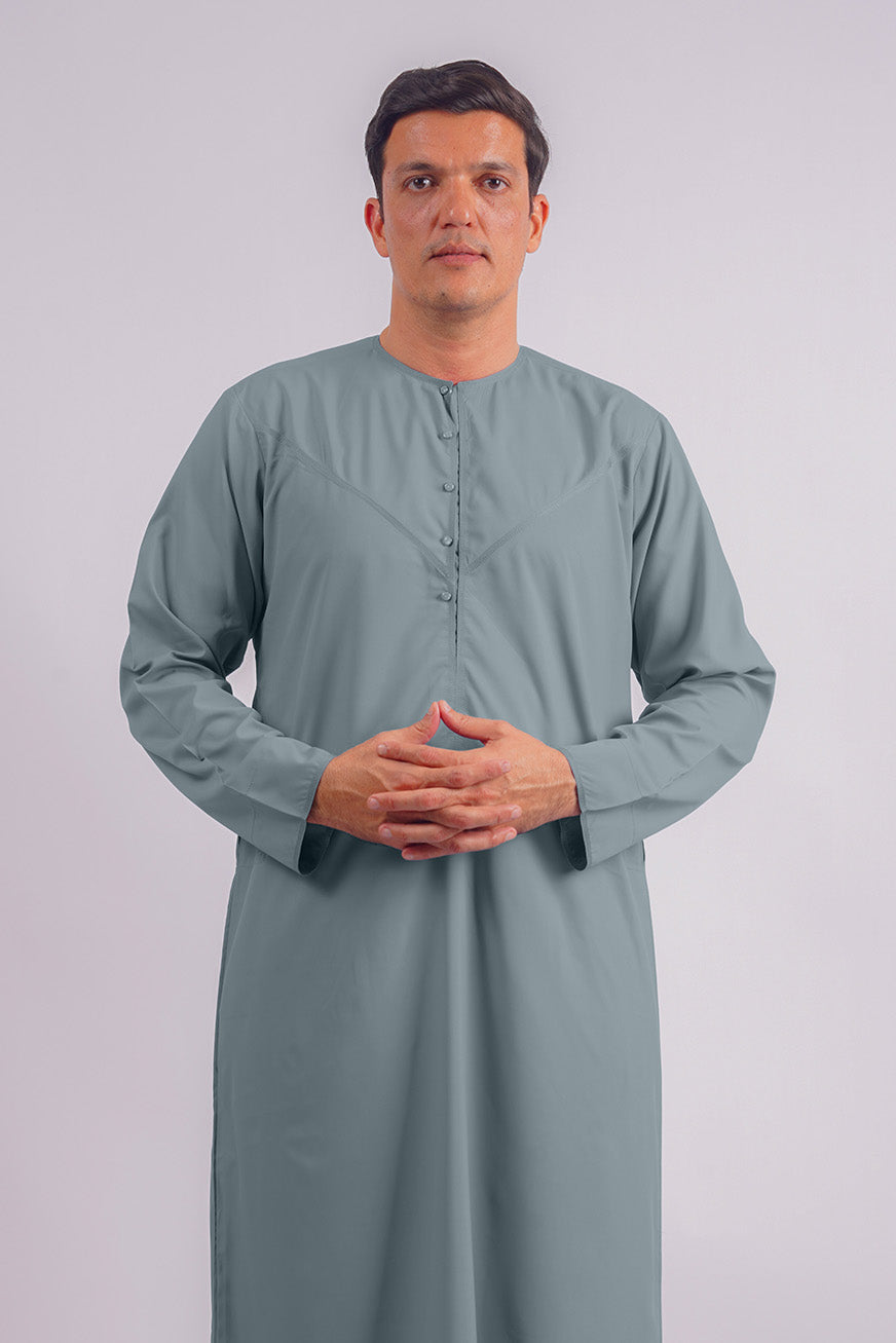 Stand out in AamsahÕs Emirati Dusty Blue Thobe, offering a stylish edge over House of Thobes with its unique color and tailored design.