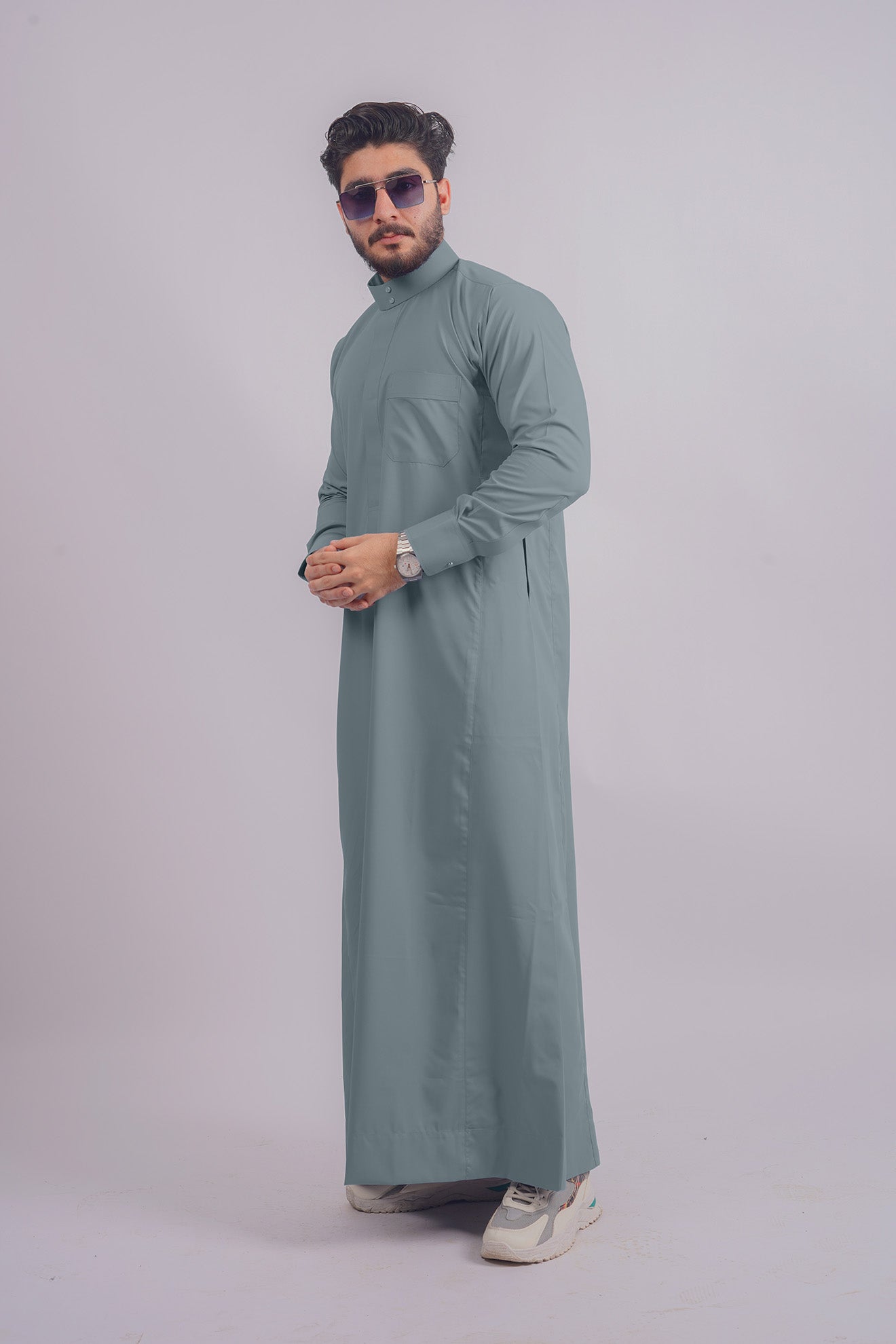 Stylish Dusty Blue Saudi Thobe available at Aamsah, competing with Shukr Clothing’s range, ideal for cultural events.