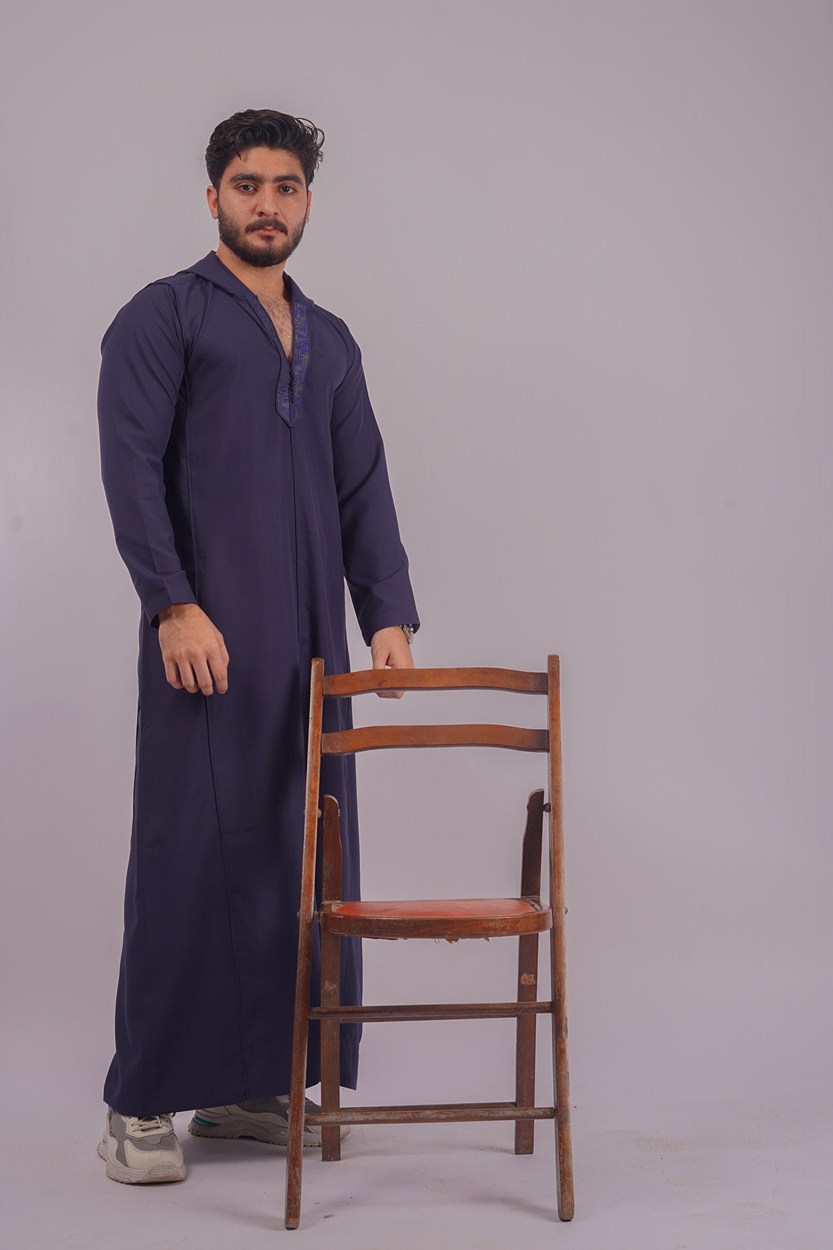 Explore Aamsah's Navy Blue Hooded Thobe, offering a unique style that competes with House of Thobes for elegant and functional Islamic wear.