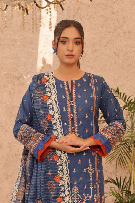 Pakistani women's Indigo Night lawn suit with coral embroidery competing with Cross Stitch and Maria B designs.