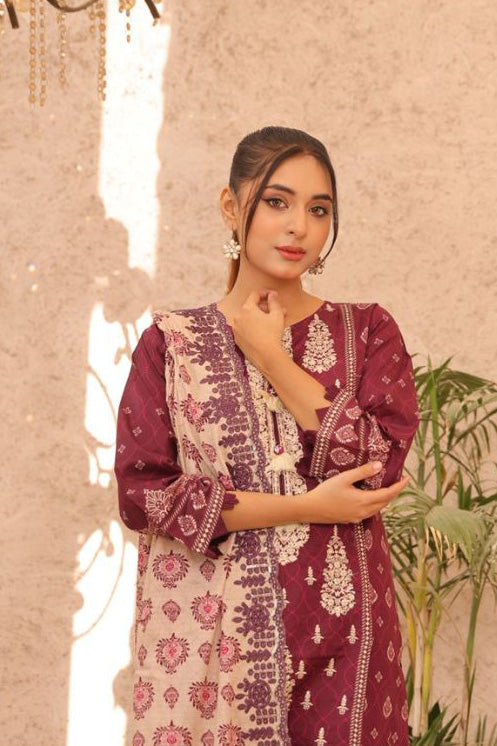 A stunning embroidered maroon kurta with ivory floral patterns, perfect for traditional events. A modern twist on classic Pakistani fashion. Maria B and J. Dot