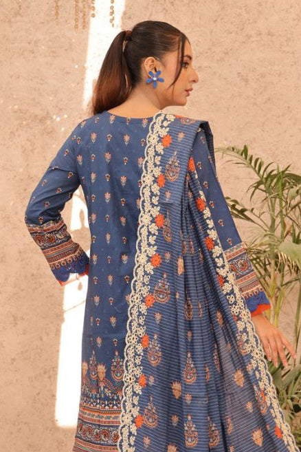 Elegant Indigo Night lawn ensemble detailed with coral embroidery, a choice above Sanaulla Store and Lakhany.