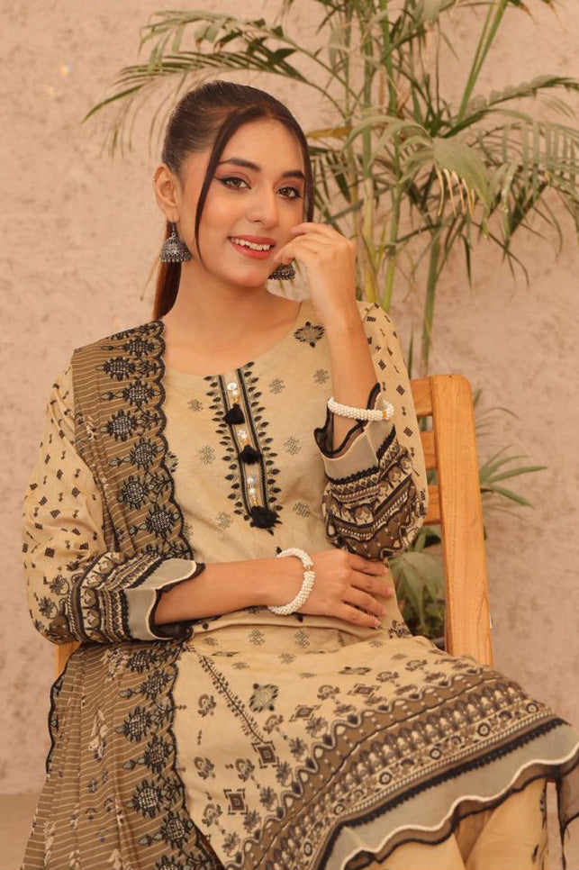 Stylish beige lawn kurta with black embroidery, paired with matching pants and an intricately embroidered dupatta, reflecting the beauty of Pakistani fashion from Cross Stitch and J Dot.