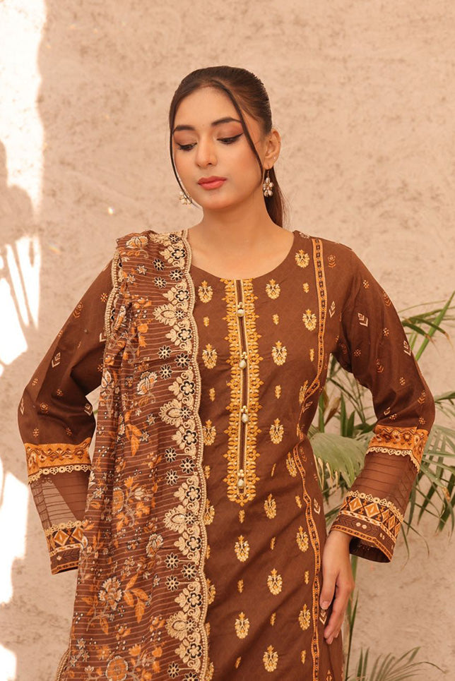 Intricately embroidered brown lawn kurta with floral patterns, perfect for stylish yet modest fashion lovers, available from Lakhany and Cross Stitch.