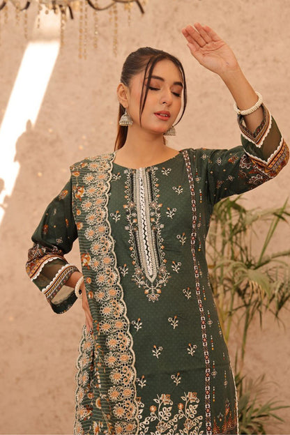 Pakistani fashion embroidered set in emerald green, featuring lawn fabric with intricate floral patterns, inspired by Lakhany and Cross Stitch.