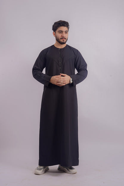Experience the sleek style of Aamsah’s Black Thobe, comparable to Shukr Clothing, designed with imported fabric for comfort and elegance.
