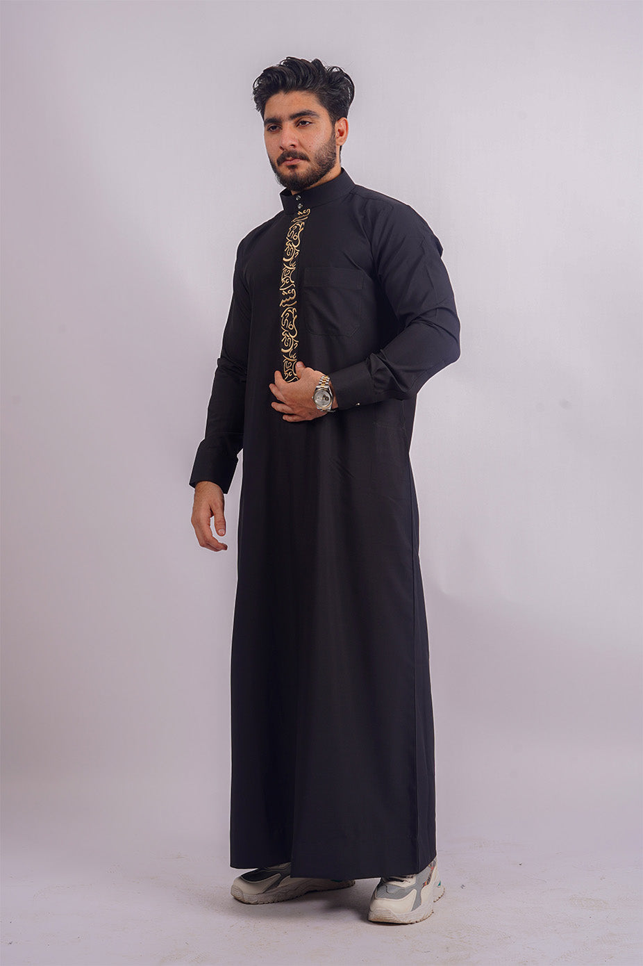 Black Embroidered Thobe from Aamsah: Combining Saudi craftsmanship with modern style for Muslim weddings and formal gatherings.