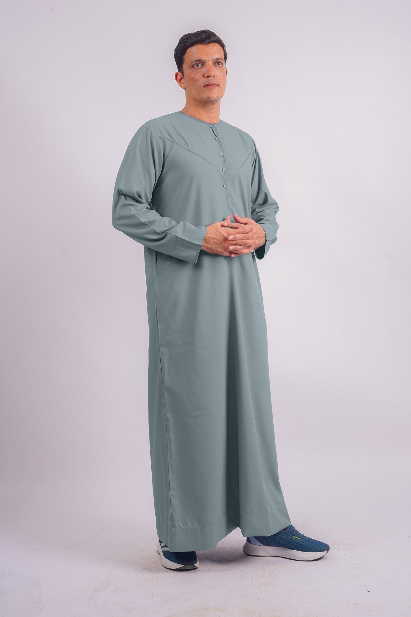 Elegant and sophisticated, AamsahÕs Dusty Blue Emirati Thobe rivals Abaya ButhÕs collection for its modern take on classic wear