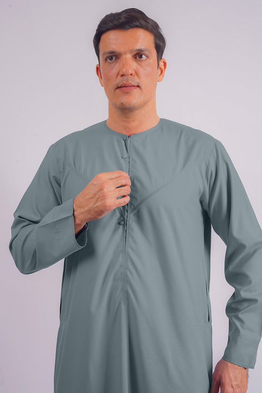 Classic Dusty Blue Dishdasha by Aamsah, crafted to meet the elegance seen at MuslimAmerican.com, ideal for special occasions and daily wear.
