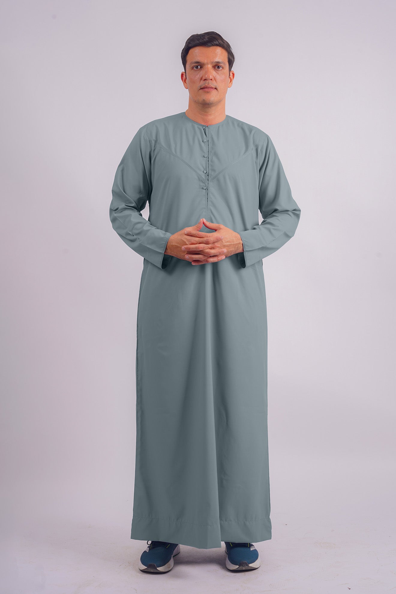 Aamsah's Emirati Dusty Blue Thobe, a refined alternative to The Muslimah Collection's traditional offerings, perfect for modern elegance