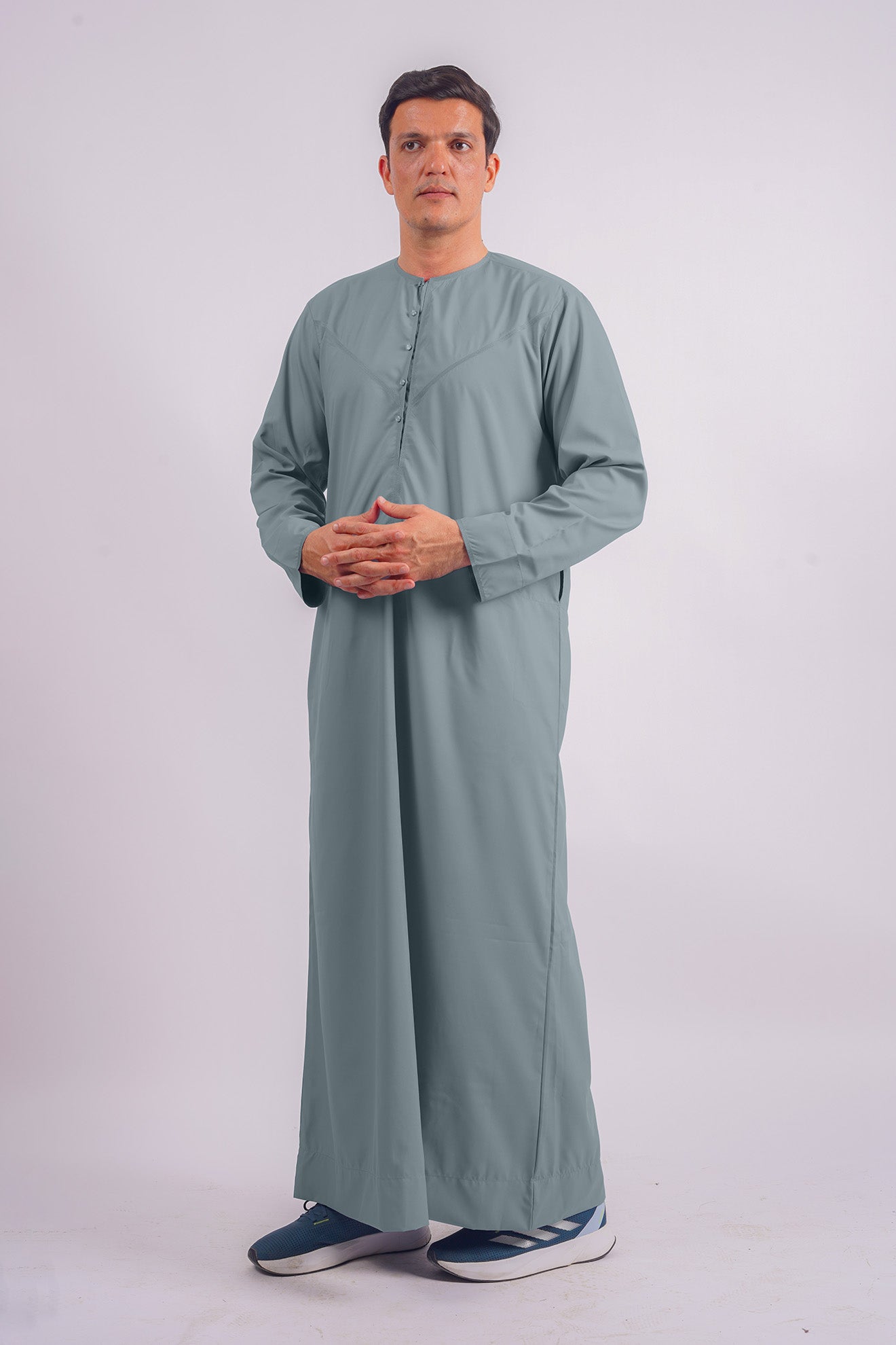 Discover Aamsah's Dusty Blue Emirati Thobe, competing with Royal Thobes in blending traditional style with contemporary fashion.