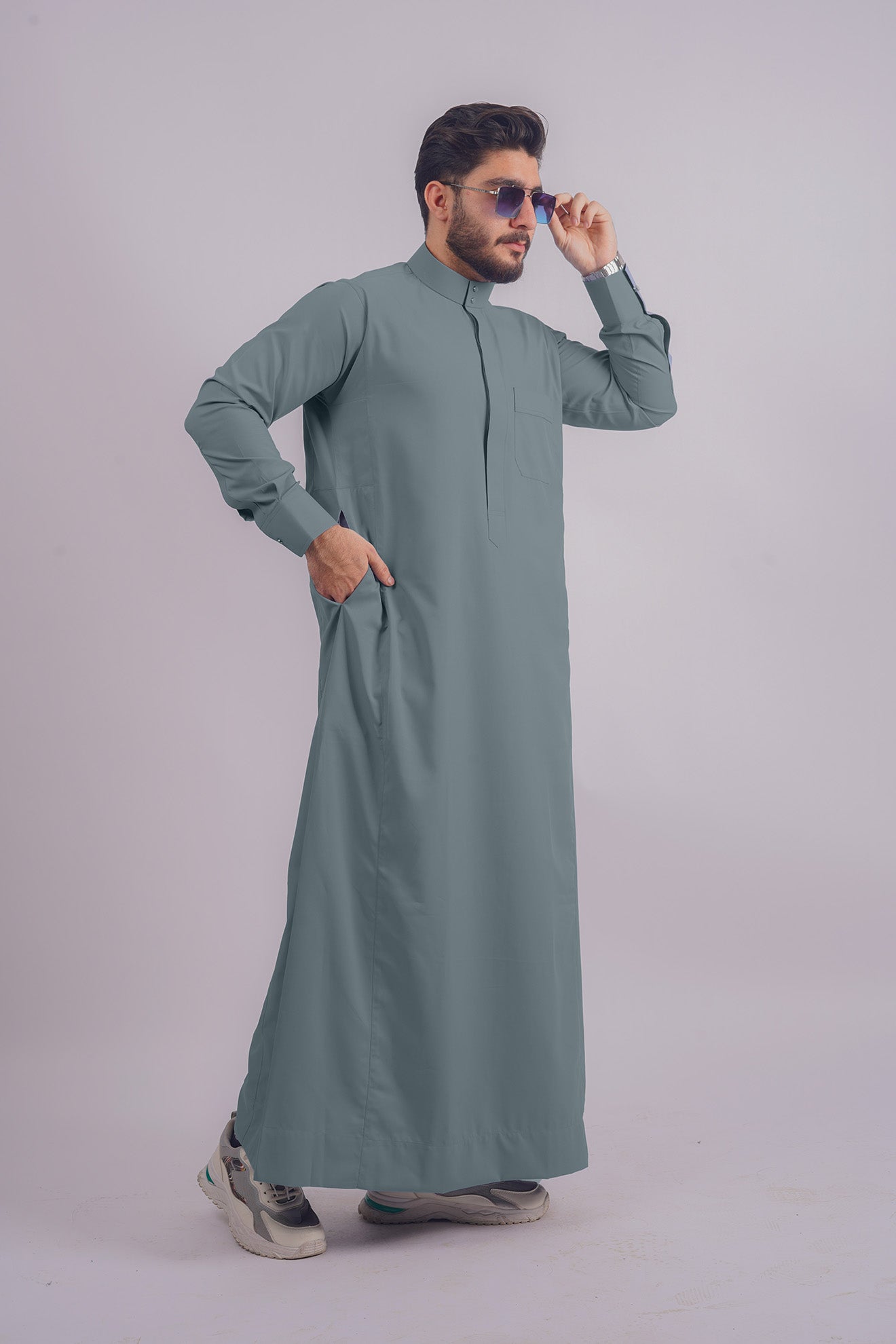Explore Aamsah's premium Dusty Blue Saudi Thobe, a match for the quality and style of My Little Jubba's thobes.