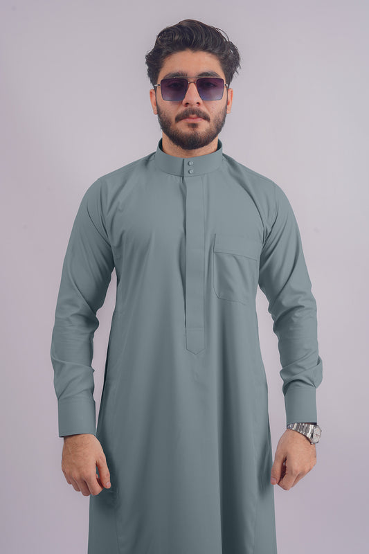 Aamsah's Dusty Blue Saudi Thobe, an elegant alternative to MuslimAmerican.com’s offerings, perfect for formal and casual wear.