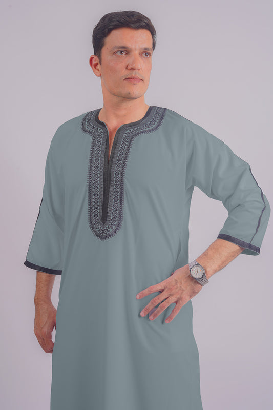 Elegant Dusty Blue Djellaba by Aamsah, featuring Moroccan artisanal embroidery for a sophisticated look.