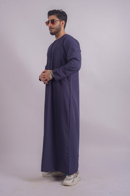 Shop Aamsah's Navy Blue Thobe, echoing the finesse of Shukr Clothing, designed for durability and timeless elegance.