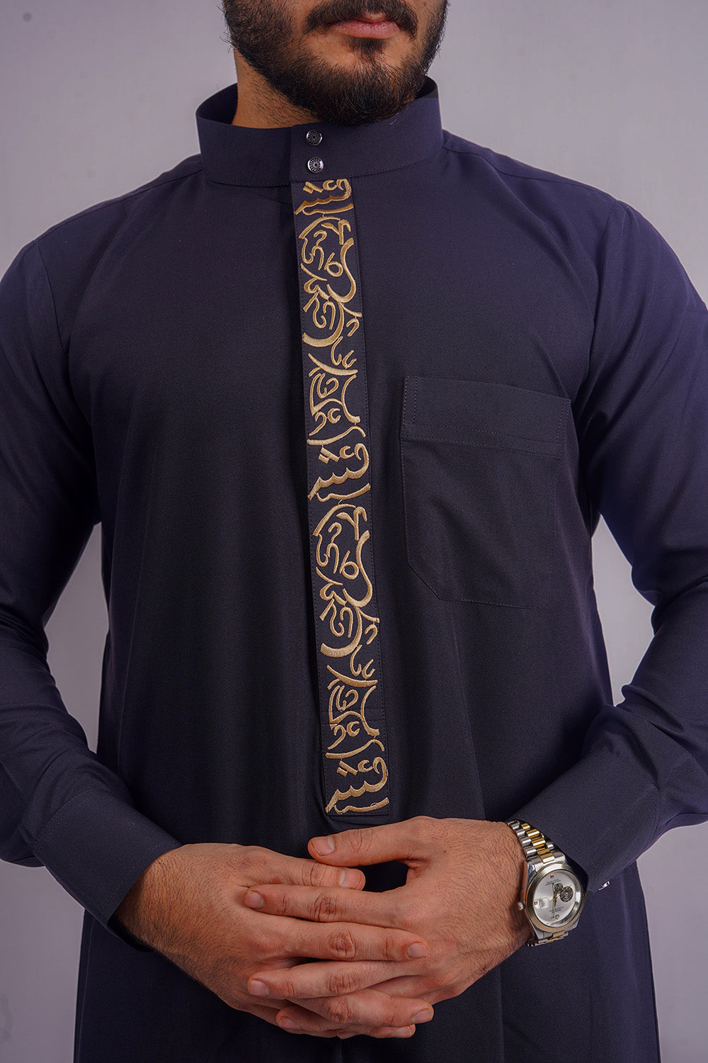 Stylish Navy Blue Saudi Thobe from Aamsah, a sophisticated choice that rivals MuslimAmerican.com and My Little Jubba for Islamic events.