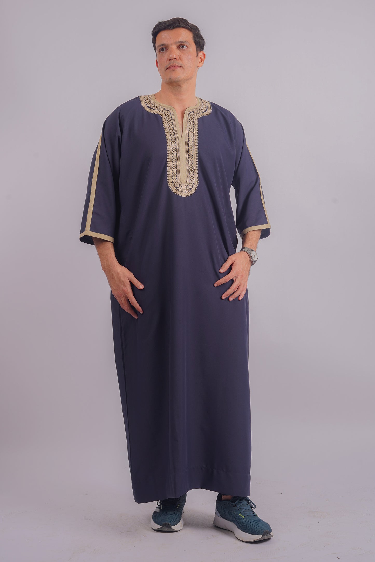 Aamsah's Navy Blue Jubba with Golden Embroidery offers regal style that competes with top Moroccan fashion, suitable for formal celebrations.