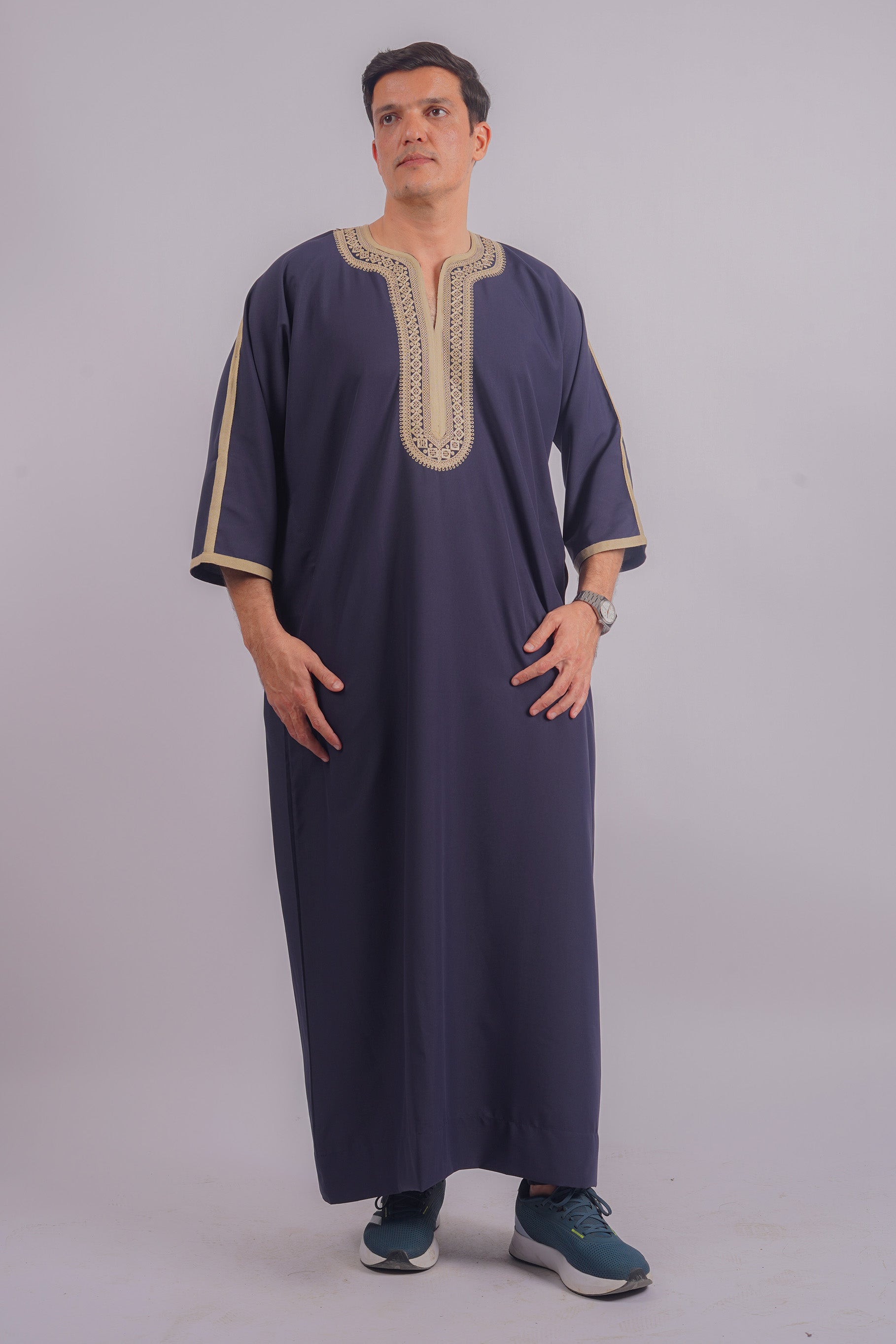 Aamsah's Navy Blue Jubba with Golden Embroidery offers regal style that competes with top Moroccan fashion, suitable for formal celebrations.
