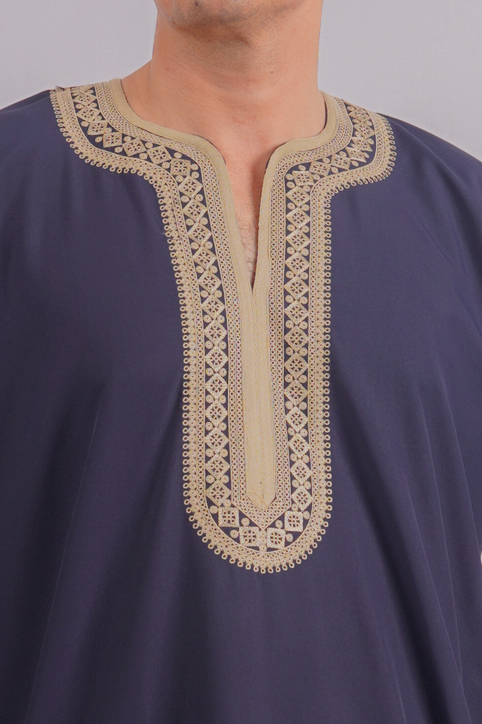 Elegant Navy Blue Djellaba by Aamsah features luxurious golden embroidery, ideal for weddings and spiritual gatherings, rivaling premium brands.