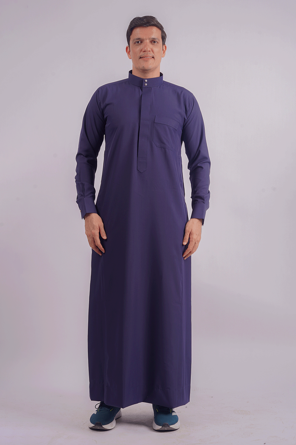 Full-length navy blue Saudi thobe showcasing premium spun fabric, functional side pockets, and finest stitching. Competitors include Shukr and Sunnah Style.