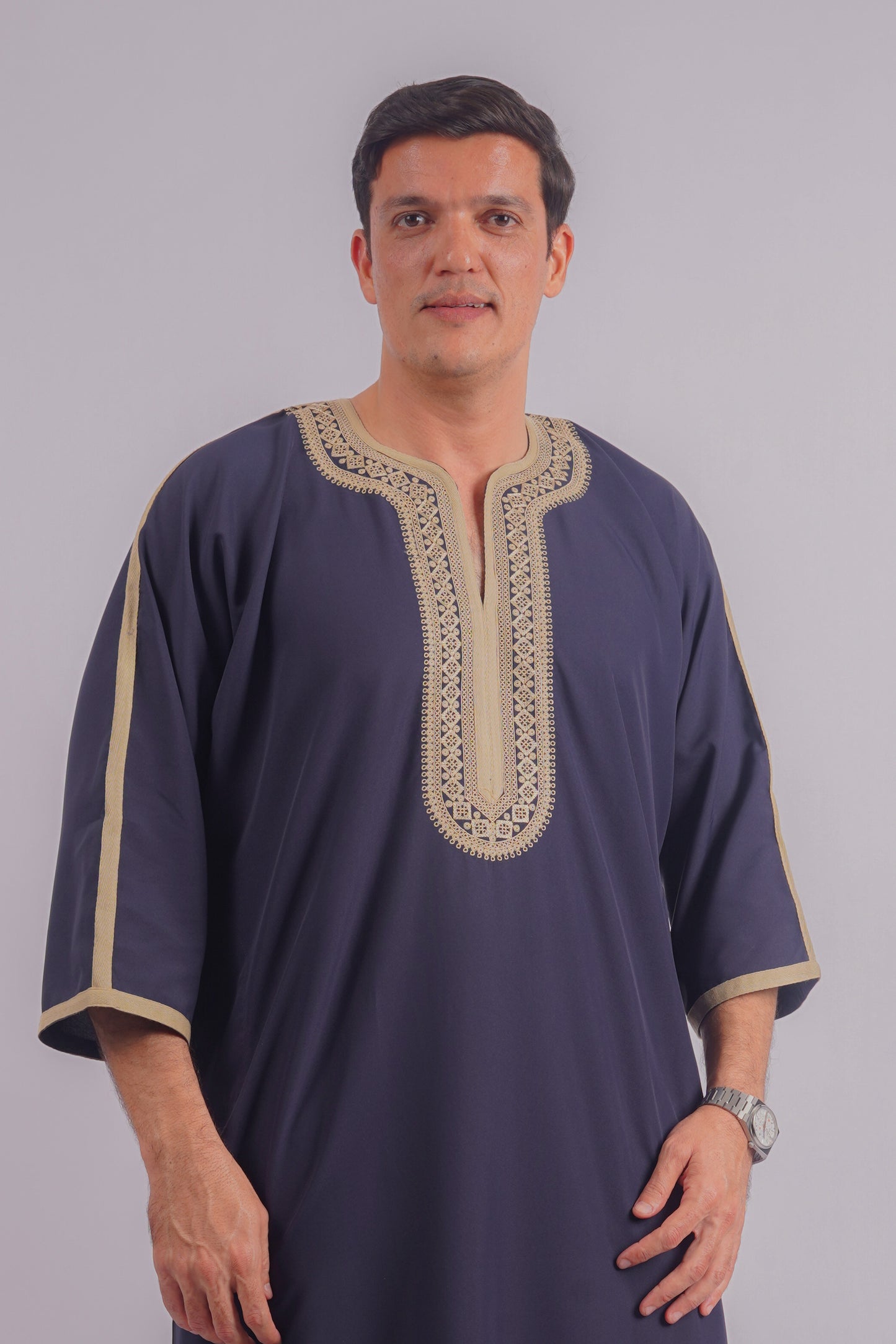 Aamsah's Navy Blue Moroccan Thobe with Golden Embroidery, showcasing traditional Djellaba elegance, perfect for formal and cultural events.