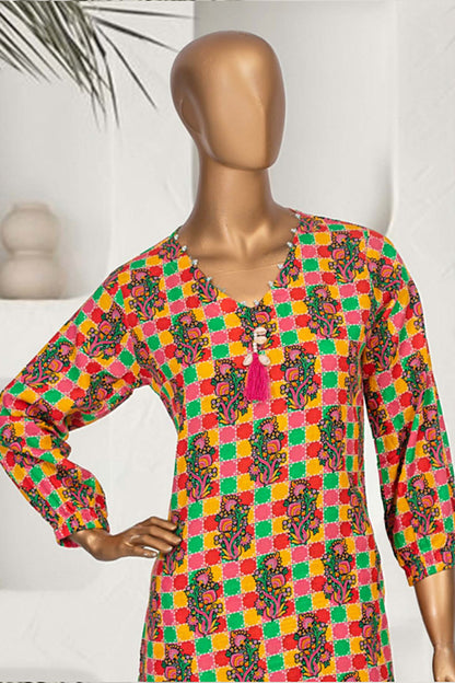 Elegant tropical mosaic kurta set combining traditional Pakistani patterns with modern style