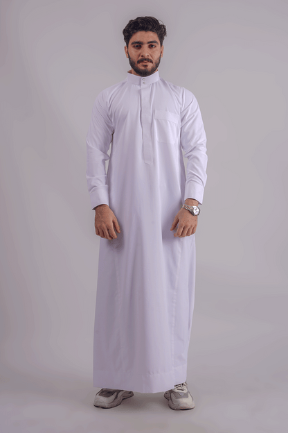 Elegant white Kuwaiti thobe with a front pocket, tailored for men, showcasing premium fabric and impeccable stitching. Competitors include Shukr and Sunnah Style.