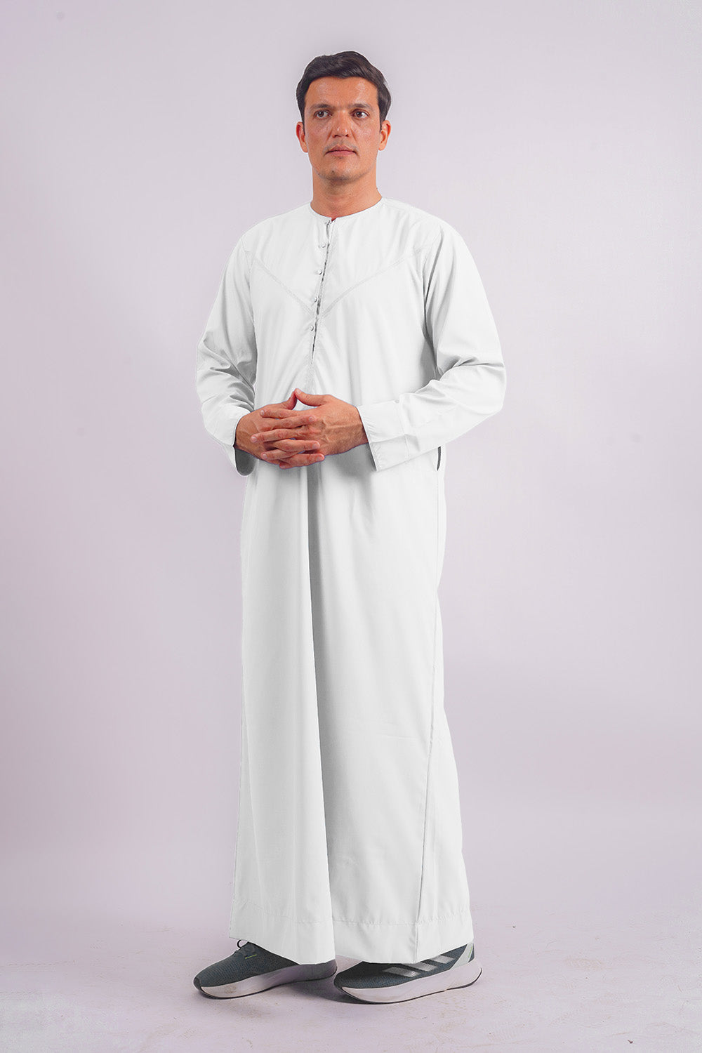 Discover the charm of Aamsah’s White Emirati Thobe, tailored to exceed standards seen at My Little Jubba, designed with practical side pockets.