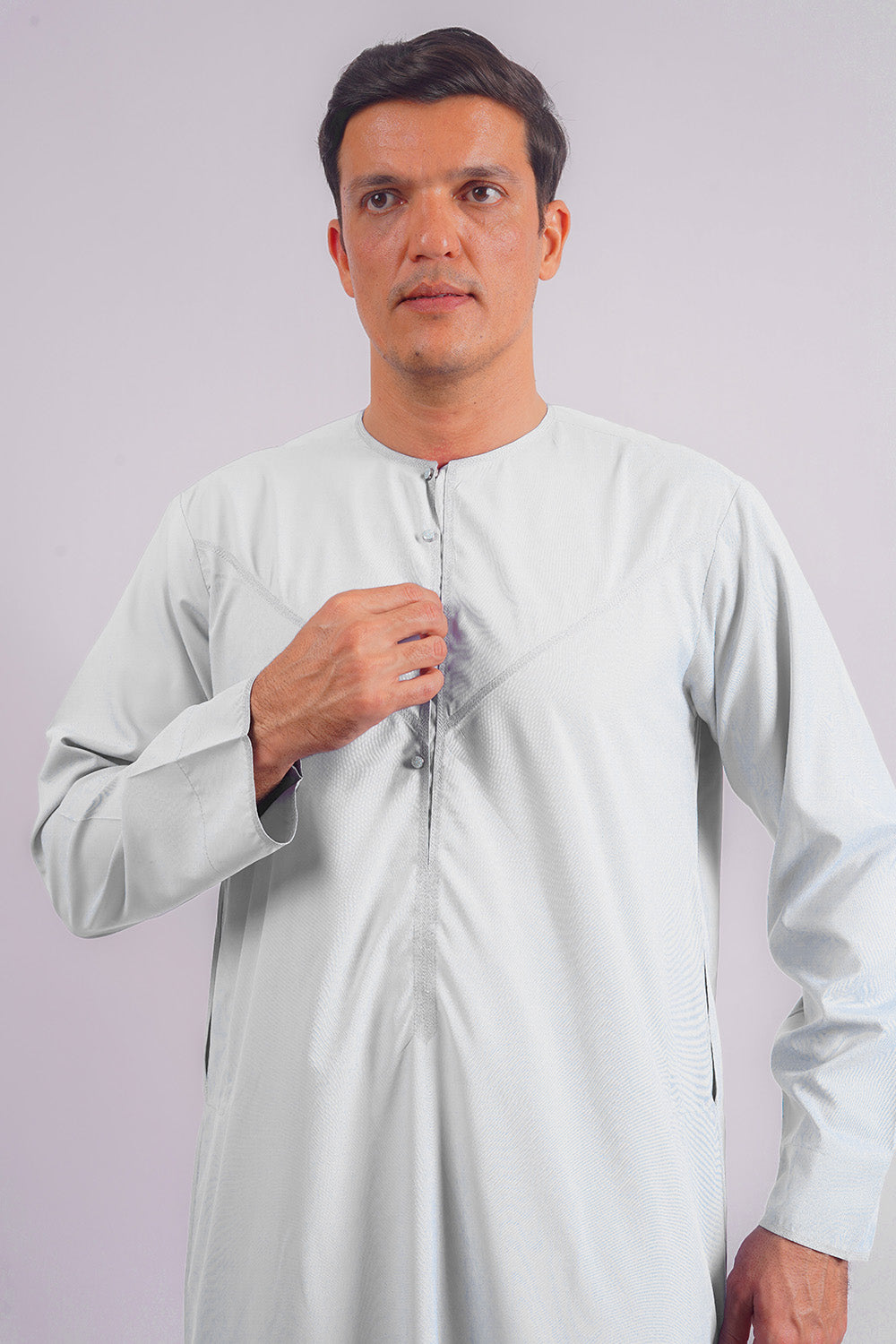 Classic Emirati Thobe by Aamsah, rivaling designs from Alqamees and Shukr Clothing, crafted from imported spun fabric for luxurious and durable wear.