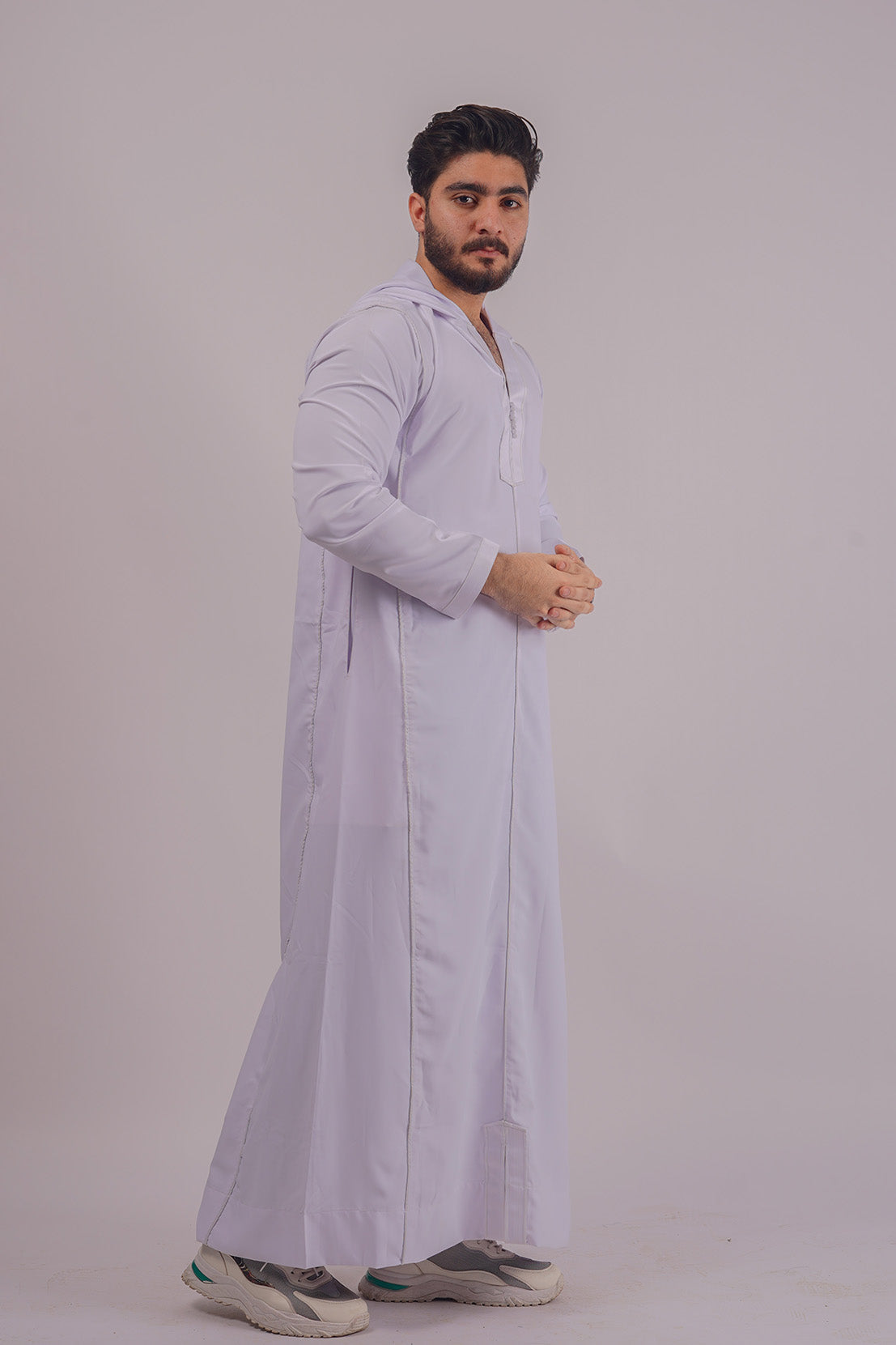 Shop Aamsah's Hooded White Thobe, a contemporary take on traditional wear, competing with offerings from Shukr Clothing.