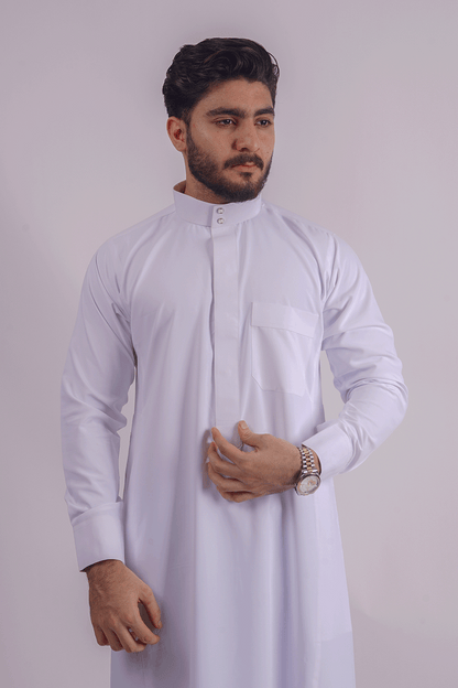 Full-length white traditional thobe for men by Aamsah, highlighting Gulf-inspired elegance with Saudi collar and professional design. Competitors: Alhannah Islamic Clothing and Modanisa.