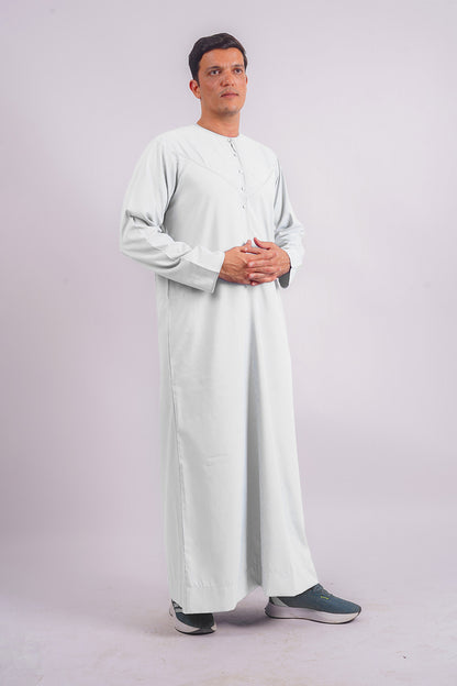 Aamsah's Premium White Emirati Thobe, blending traditional craftsmanship with modern finesse, a stylish alternative to offerings from Al Aniq.