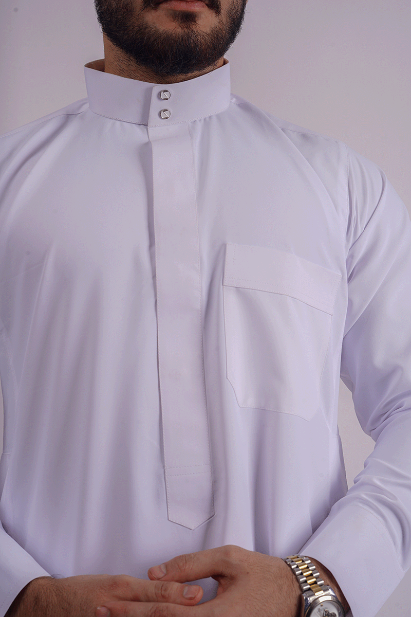White Saudi Thobe for men by Aamsah, crafted from premium spun fabric with a Saudi collar and traditional Kuwaiti design, inspired by the collections of Muslim American Store, Crown Thobe, and Thee Thobe.