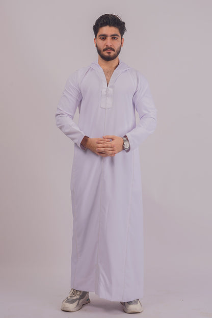 Aamsah's Hooded White Thobe, a stylish alternative to traditional attire from MuslimAmerican.com, perfect for versatile styling.