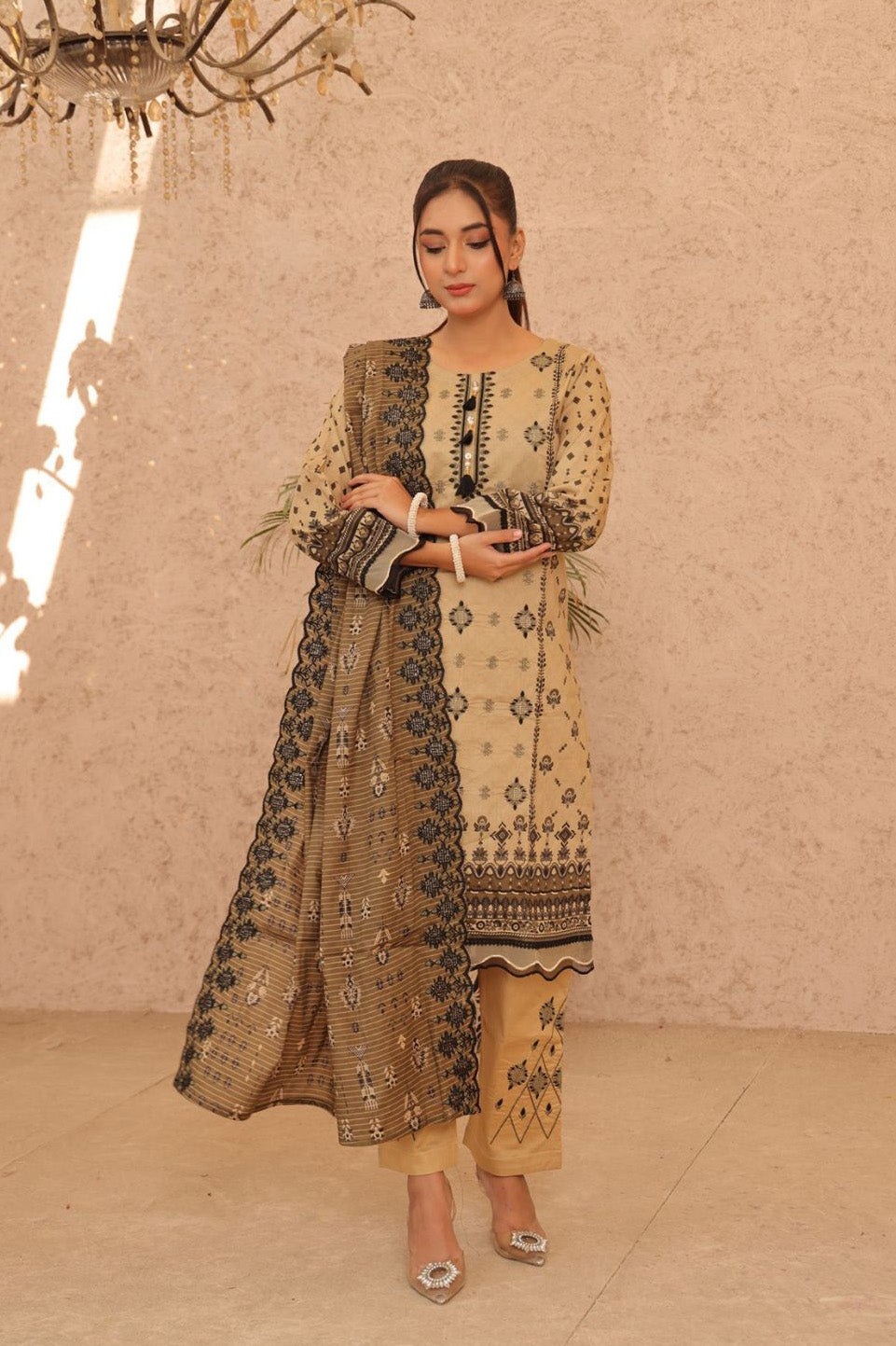 Modern and traditional blend: Earthy beige embroidered kurta and dupatta set, with geometric and floral designs, inspired by Al Karam and Deshi Besh.