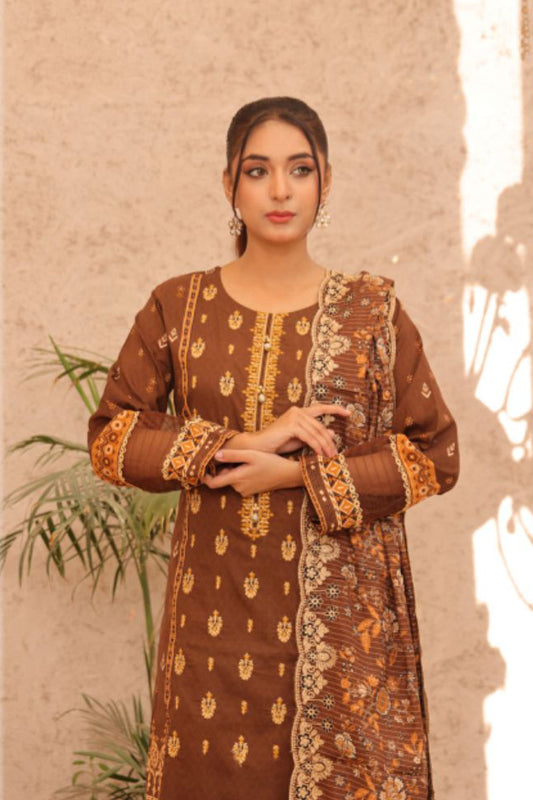 Elegant floral embroidered kurta and matching pants with dupatta in earthy brown, inspired by Pakistani fashion from Sanaulla Store and Al Karam.